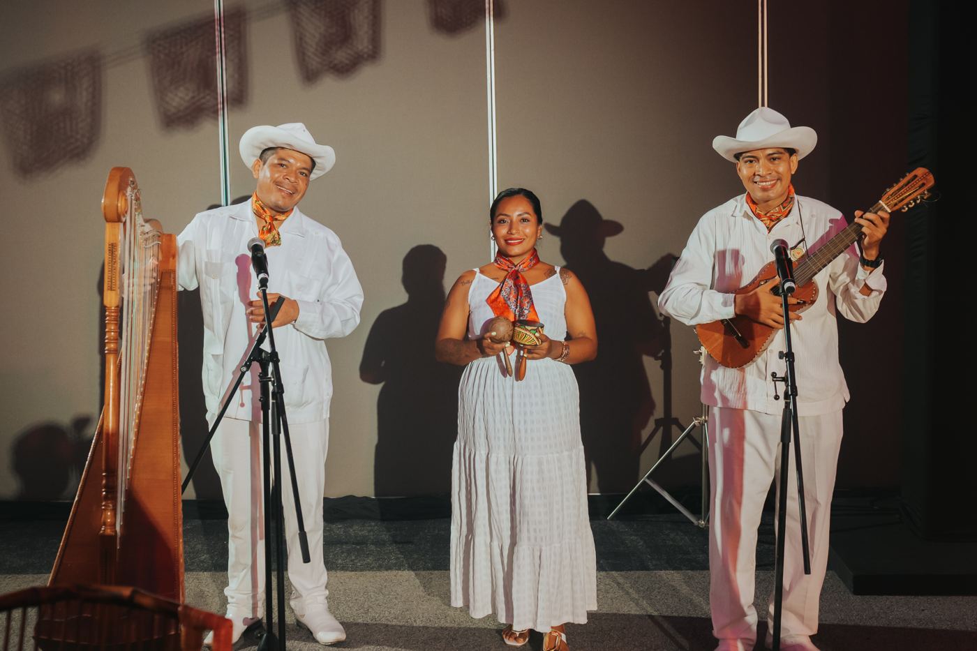 A traditional Mexican trio performing for wedding guests