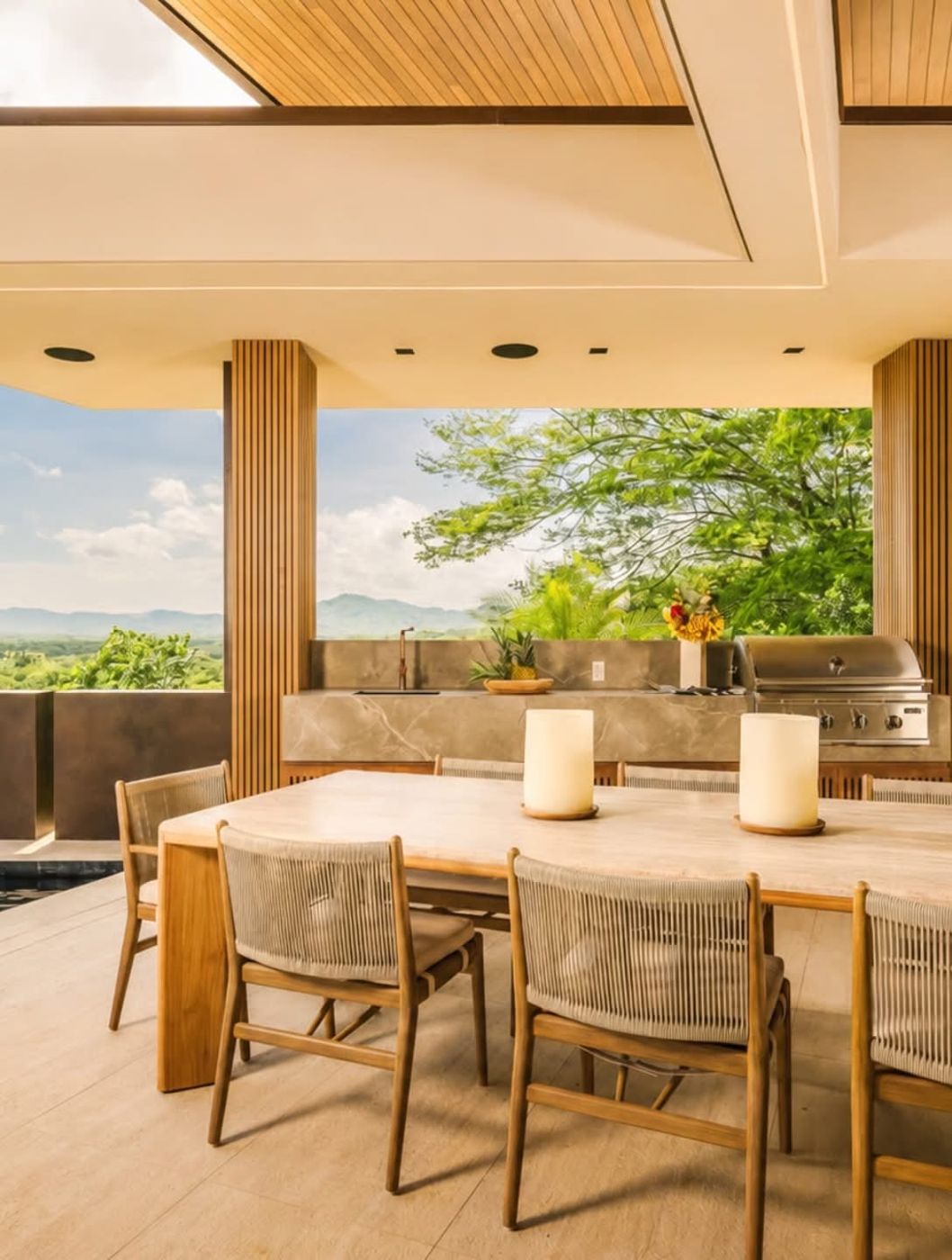 Open-air dining table and outdoor kitchen
