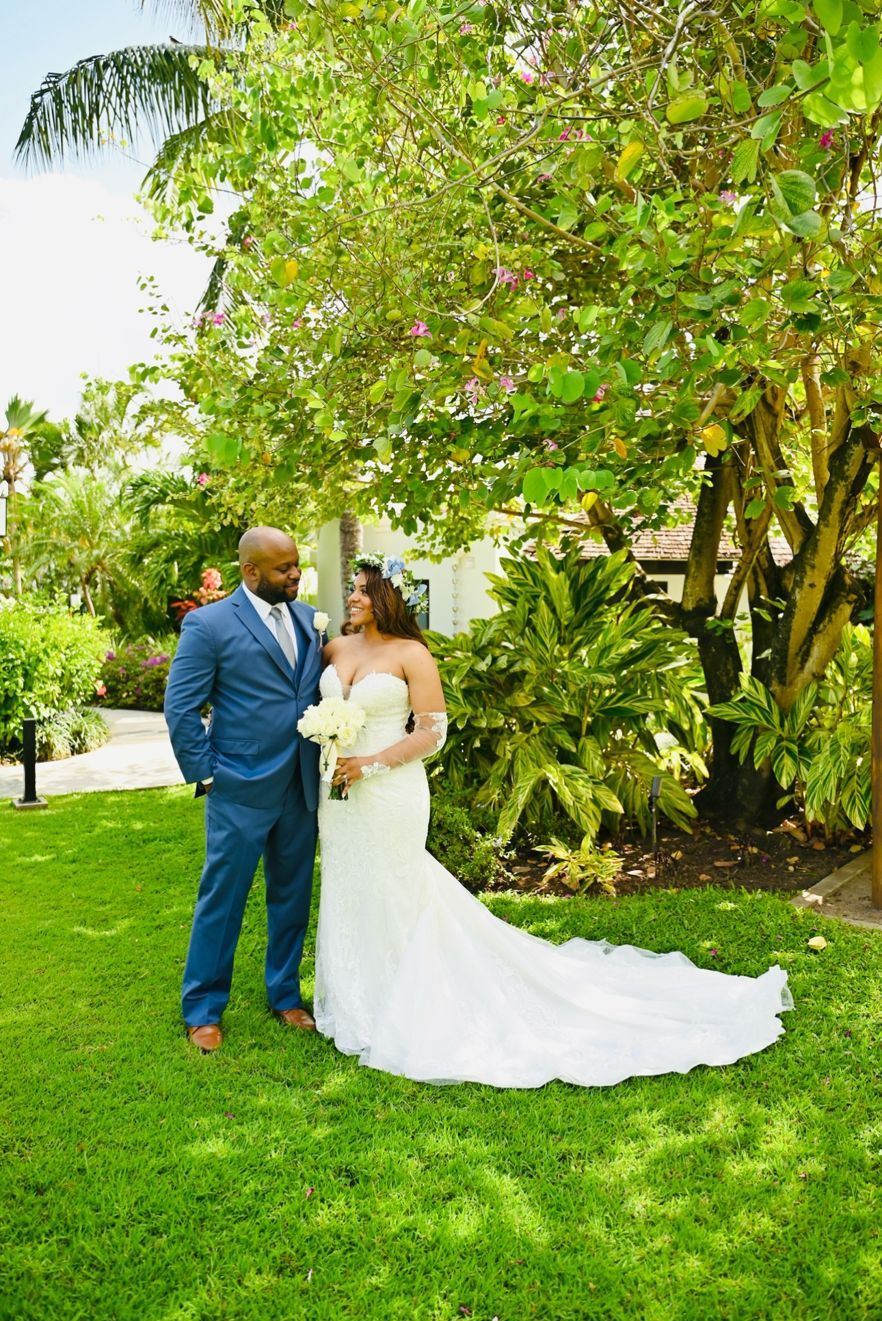 Bride and groom in a resort garden